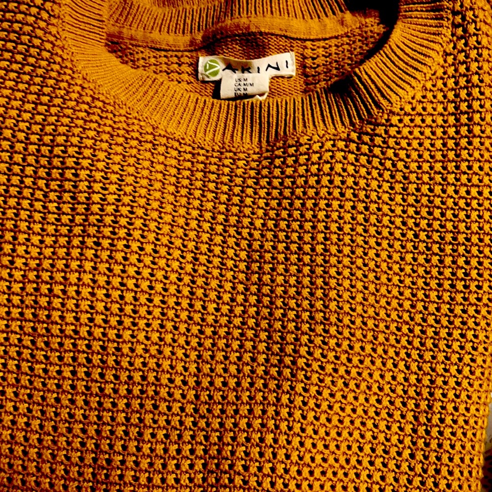 Mustard colored sweater with zipper on either side